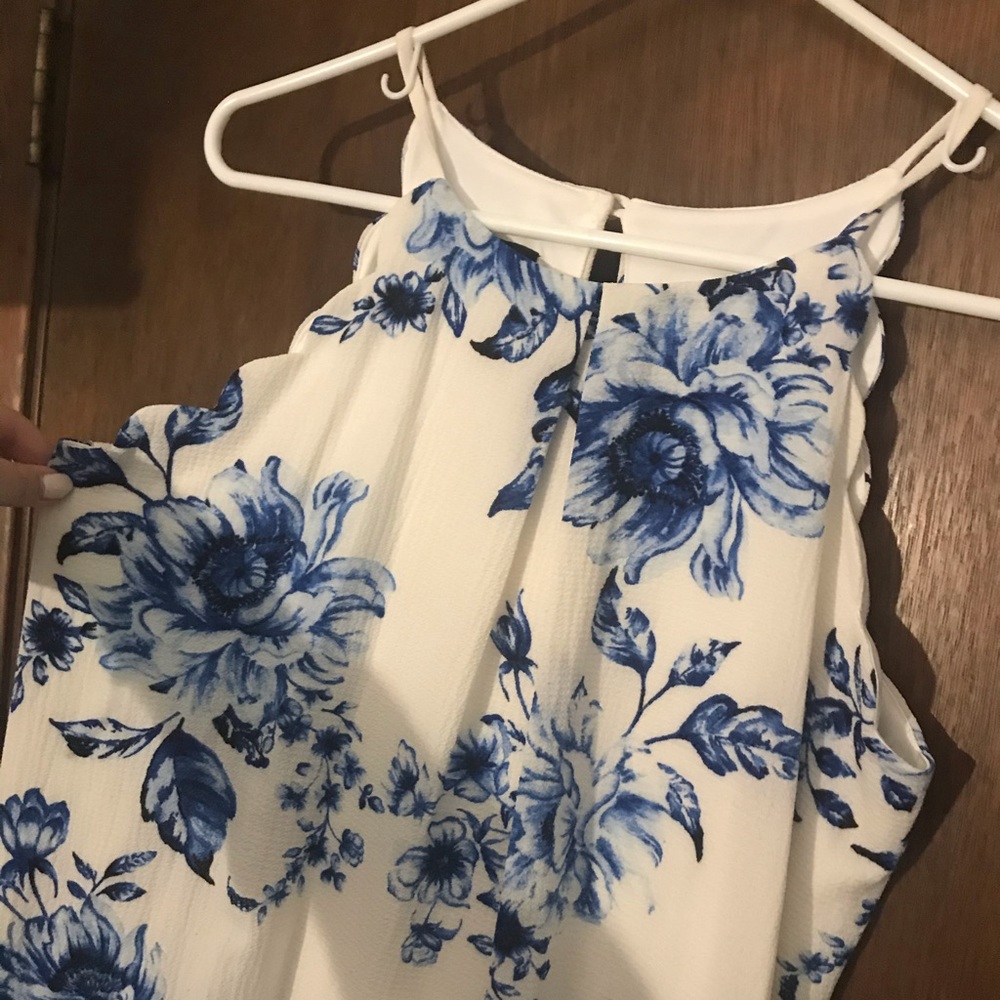 White medium length dress with blue flowers